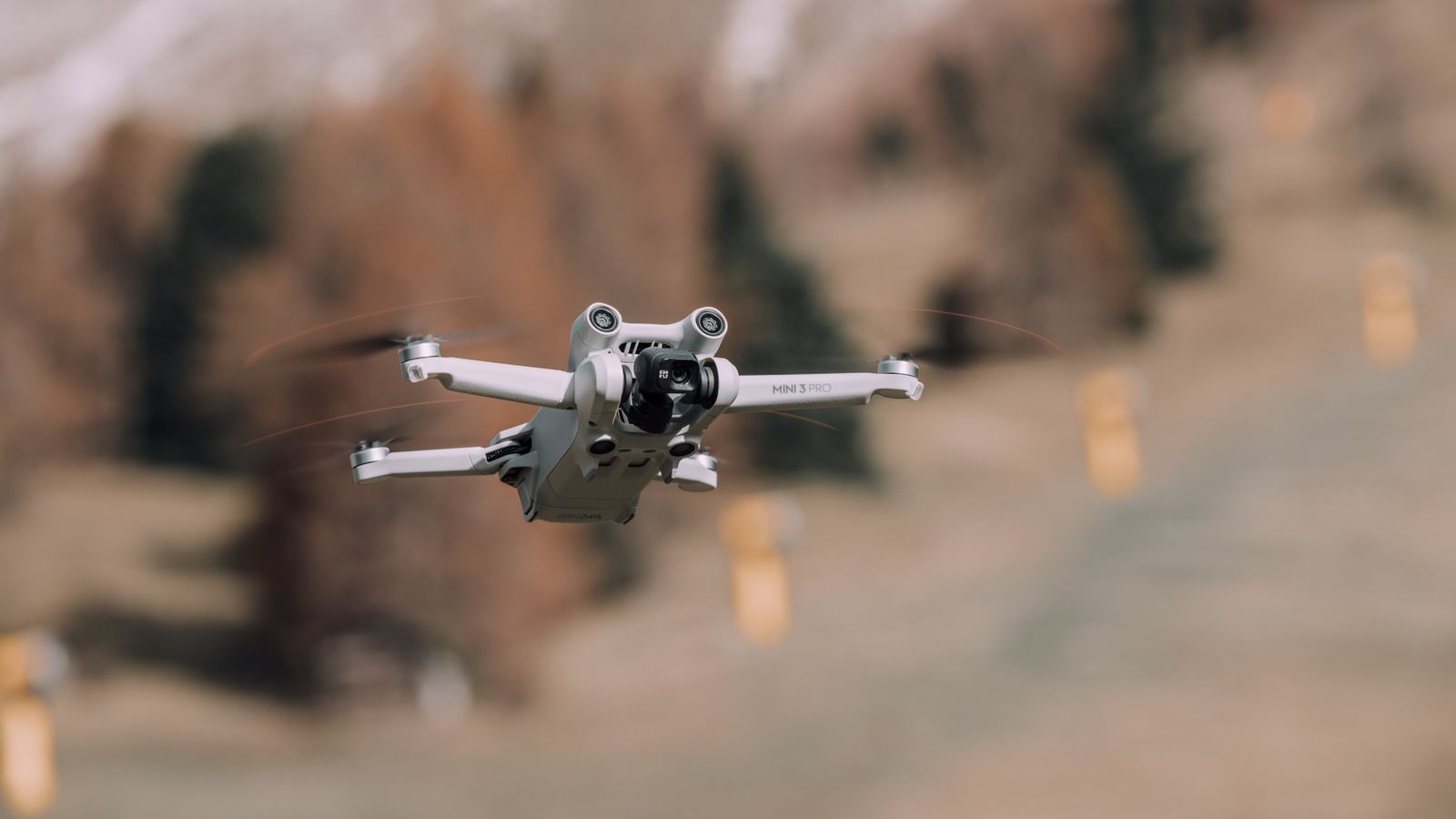 Camera drone flying over a European alpine landscape